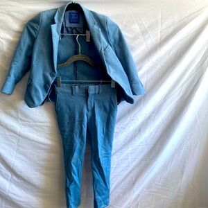 Baby blue. Dress suit outfit. Worn. Great condition Extra small TO stretch